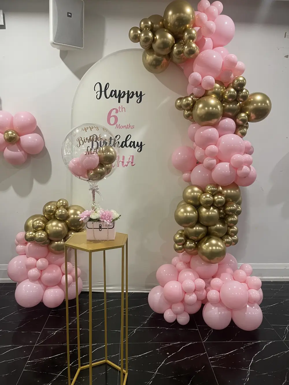 Sweet Pink & Gold Balloon Arch for a 6-Month Birthday Celebration