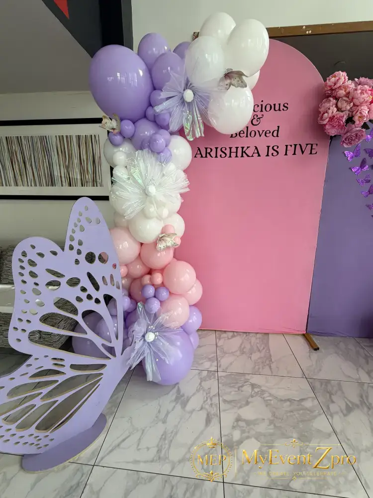 Whimsical Butterfly Dual-Arch Backdrop & Pastel Balloon Garland Setup